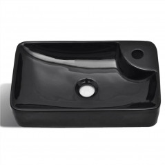 Badezimmerwaschbecken aus Keramik mit schwarzem Wasserhahnloch
